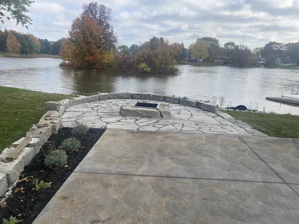 Patio with custom fire pit and seating area