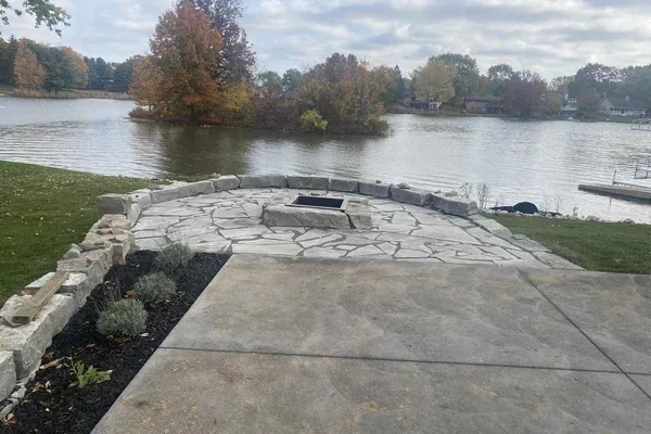 Patio with custom fire pit and seating area